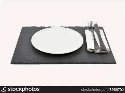 Table setting on slate isolated