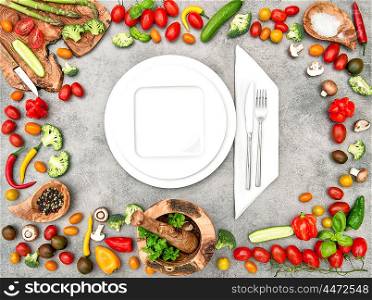 Table setting with fresh vegetables. Healthy food concept