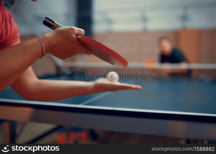Table tennis, male and female ping pong players. Couple playing table-tennis indoors, sport game with racket and ball, active healthy lifestyle. Table tennis, male and female ping pong players