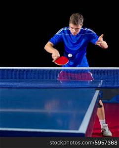 Table tennis player isolated on black