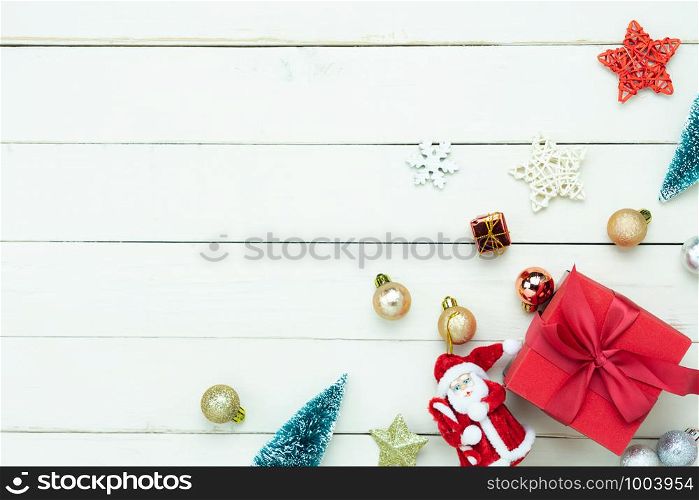 Table top view of Merry Christmas decorations & Happy new year ornaments concept.Flat lay essential difference objects on modern rustic wood white background at home studio office desk.Mock up design.