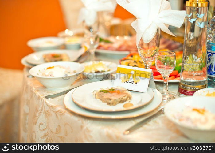 Table with the spread-out devices and food.. Laid the table.