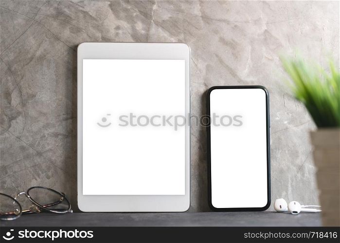 tablet and phone showing blank screen