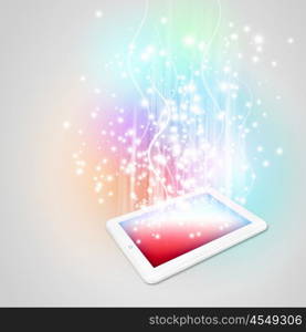 Tablet pc. Image of tablet pc with color lights and splashes