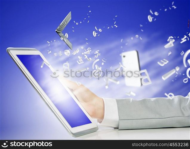 Tablet pc in hand. Close up image of human hand holding tablet pc