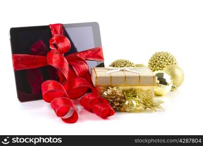 tablet pc with christmas decorations on white background