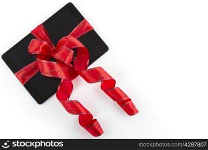tablet pc with christmas decorations on white background