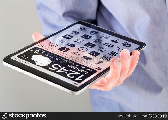 Tablet with a transparent display in human hands. Concept actual future innovative ideas and best technologies humanity.