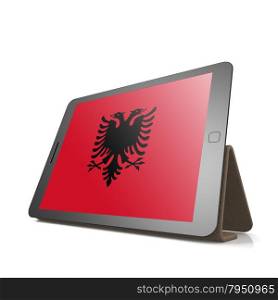 Tablet with Albania flag image with hi-res rendered artwork that could be used for any graphic design.. Shareholder word cloud on tablet