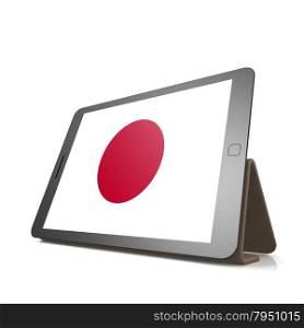 Tablet with Japan flag image with hi-res rendered artwork that could be used for any graphic design.. Shareholder word cloud on tablet
