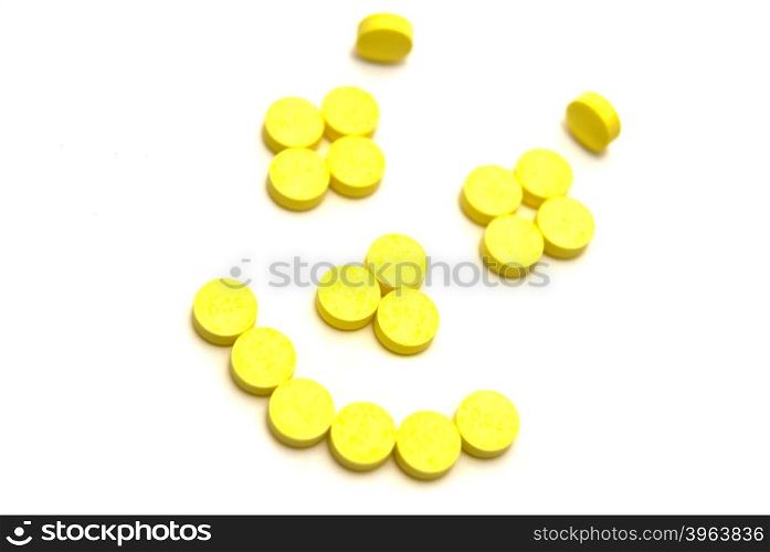 Tablets smiling face on white background