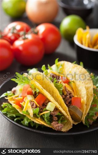 taco shells with beef and vegetables