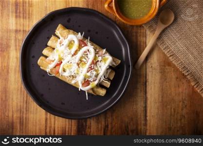 Tacos Dorados. Mexican dish also known as Flautas, consists of a rolled corn tortilla with some filling, commonly chicken or beef or vegetarian options such as potatoes.