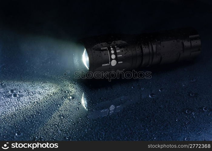 Tactical waterproof flashlight with waterdrops and smoke