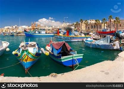 Taditional eyed boats Luzzu in Marsaxlokk, Malta. Traditional eyed colorful boats Luzzu in the Harbor of Mediterranean fishing village Marsaxlokk, Malta