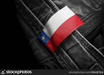 Tag on dark clothing in the form of the flag of the Chile.. Tag on dark clothing in the form of the flag of the Chile