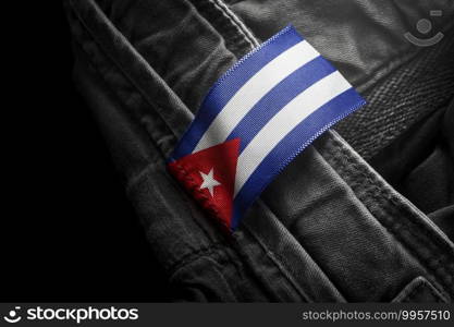 Tag on dark clothing in the form of the flag of the Cuba.. Tag on dark clothing in the form of the flag of the Cuba