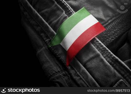 Tag on dark clothing in the form of the flag of the Kuwait.. Tag on dark clothing in the form of the flag of the Kuwait