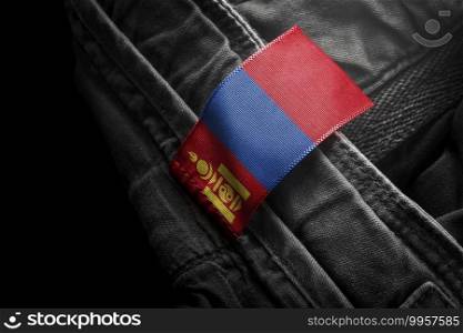 Tag on dark clothing in the form of the flag of the Mongolia.. Tag on dark clothing in the form of the flag of the Mongolia