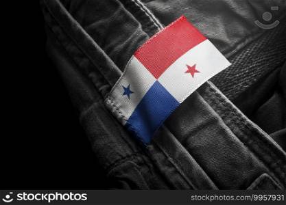 Tag on dark clothing in the form of the flag of the Panama.. Tag on dark clothing in the form of the flag of the Panama