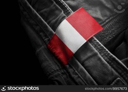 Tag on dark clothing in the form of the flag of the Peru.. Tag on dark clothing in the form of the flag of the Peru