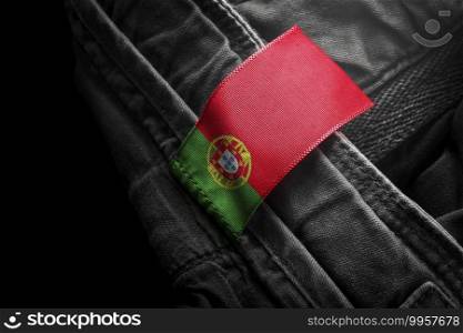 Tag on dark clothing in the form of the flag of the Portugal.. Tag on dark clothing in the form of the flag of the Portugal