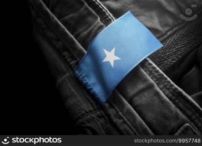 Tag on dark clothing in the form of the flag of the Somalia.. Tag on dark clothing in the form of the flag of the Somalia