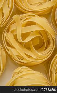 Tagliatelle, close up isolated on white background