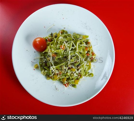 Tagliatelle pasta with pesto.Selective focus