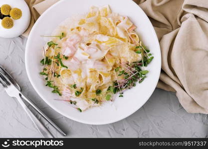 tagliatelle pasta with salmon with parmesan in cream sauce