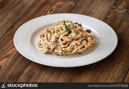 Tagliatelle with porcini mushrooms and creamy sauce