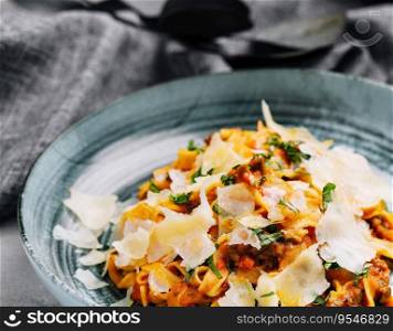 Tagliatelle with ragu bolognese sauce with parmesan
