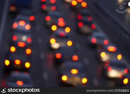 Tail Lights Shining Brightly In A Traffic Jam On Motorway