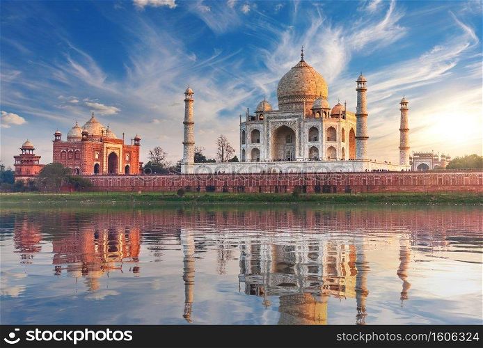 Taj Mahal at sunset, back view from the Yamuna river, Agra, India.