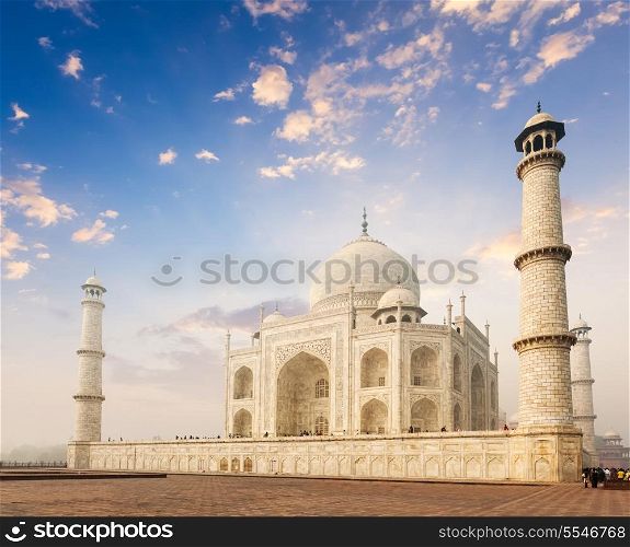 Taj Mahal on sunrise. Indian Symbol - India travel background. Agra, India