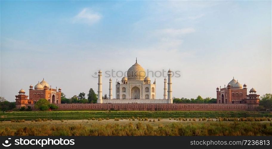 Taj Mahal seen from Mehtab Bagh, an ivory-white marble mausoleum on the south bank of the Yamuna river in Agra, Uttar Pradesh, India. One of the seven wonders of the world.. Taj Mahal seen from Mehtab Bagh.