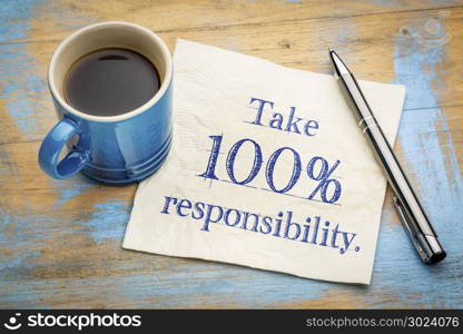 Take 100% responsibility reminder note - handwriting on a napkin