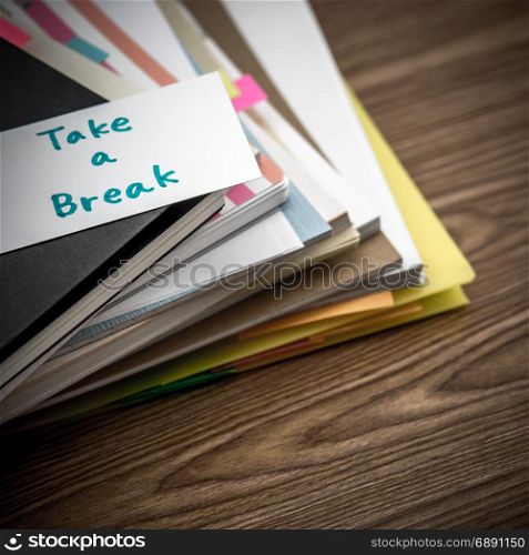 Take a Break; The Pile of Business Documents on the Desk