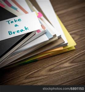 Take a Break; The Pile of Business Documents on the Desk
