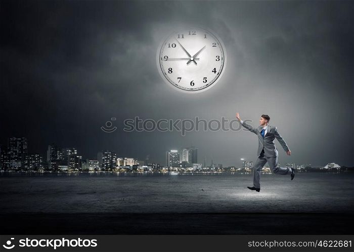 Take a short break. Concept of relaxation with businessman running with color balloon in hand