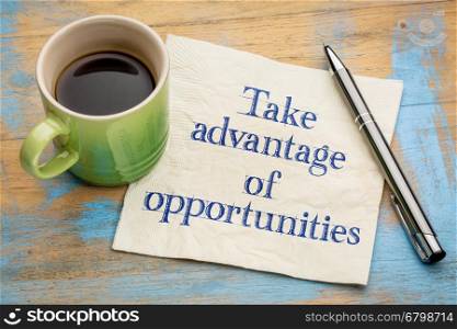 Take advantage of opportunities - handwriting on a napkin with a cup of espresso coffee