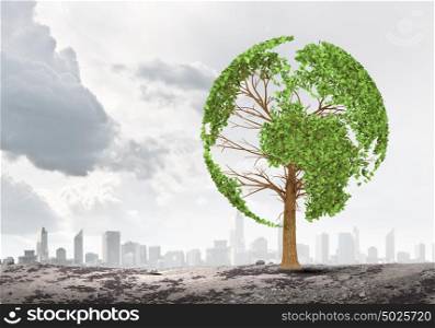 Take care of our home. tree in shape of Earth planet