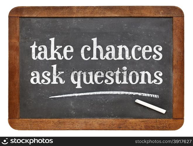 Take chances, ask questions - motivational advice on a vintage slate blackboard