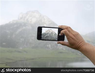 taking a picture of a mountain with a mobile