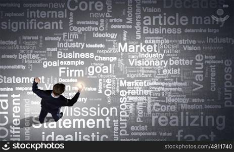 Talking on mobile. Top view of emotional businessman with mobile phone in hand
