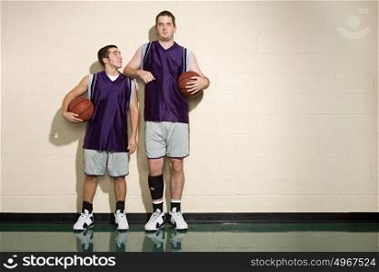 Tall and short basketball players