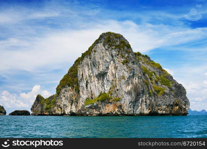 tall cliff with trees at Andaman Sea, Thailand