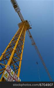Tall crane working overhead
