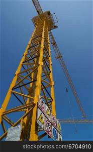 Tall crane working overhead