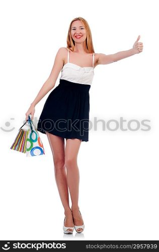 Tall girl after good shopping on white